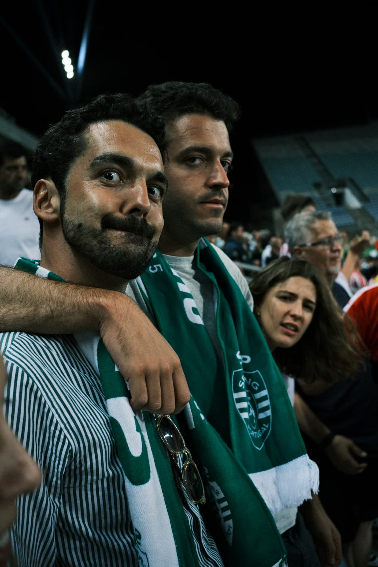 At the stadium with scarves